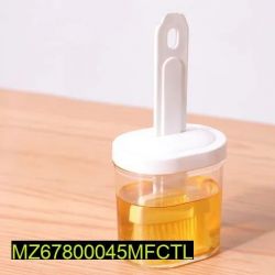 Plastic oil container with brush