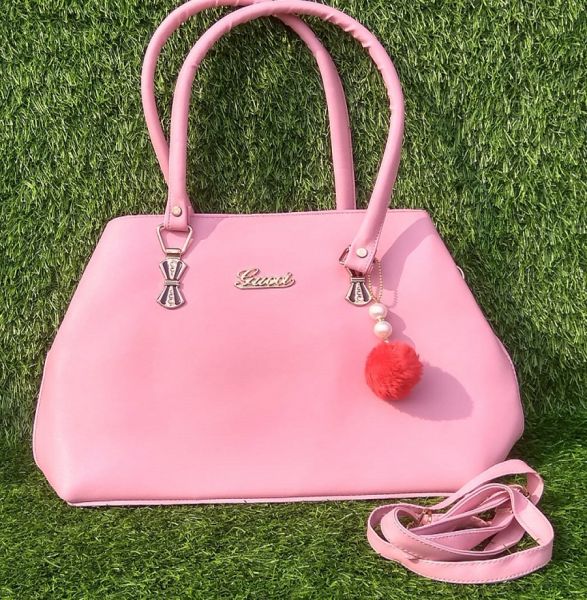 Ladies handbags in pink color for wedding, party, festival, etc. 