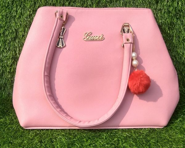 Ladies handbags in pink color for wedding, party, festival, etc. 