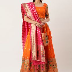 Orange color lehenga Choli in jacquard material & all-over weaving work comes with micro cotton inner and canvas inside.