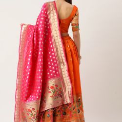 Orange color lehenga Choli in jacquard material & all-over weaving work comes with micro cotton inner and canvas inside.
