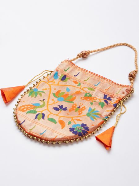 Orange color lehenga Choli in jacquard material & all-over weaving work comes with micro cotton inner and canvas inside.
