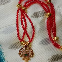 Red pearl long necklace ! With guaranteed pendant .